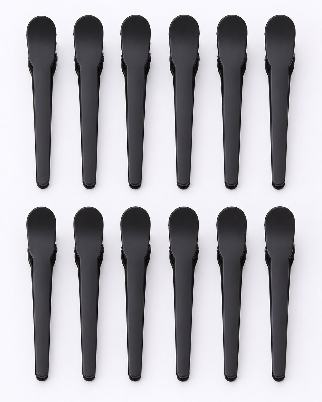 All twelve black clips laid out in a neat row