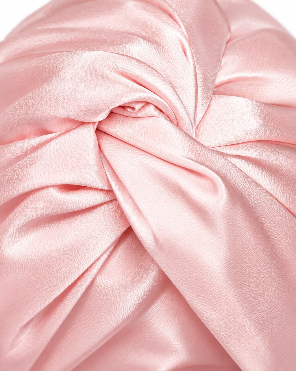Close-up of the twisted satin front and soft sheen of the turban