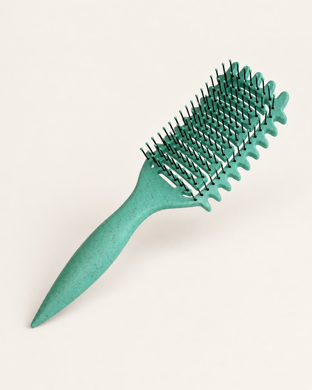 Green speckled curl defining brush