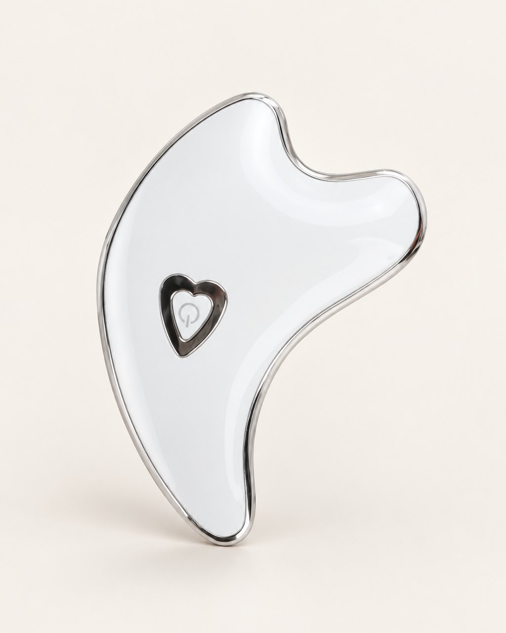 White dolphin-shaped gua sha with a heart light in the middle