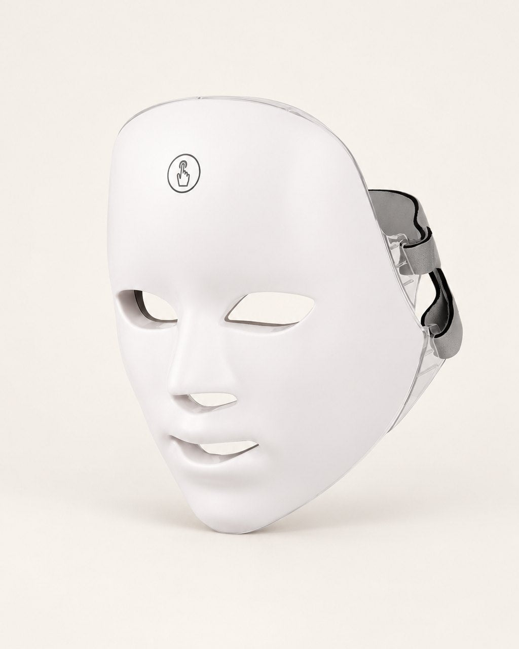 White LED face mask with a touch button on the forehead, on a light background